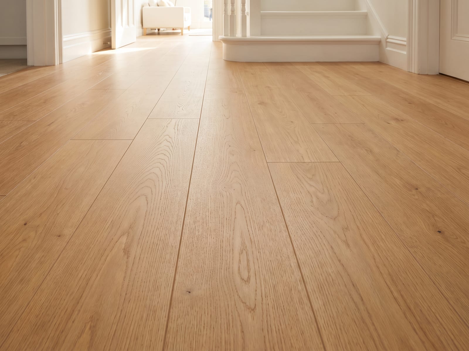 Laminate flooring, honey oak planks in a hallway